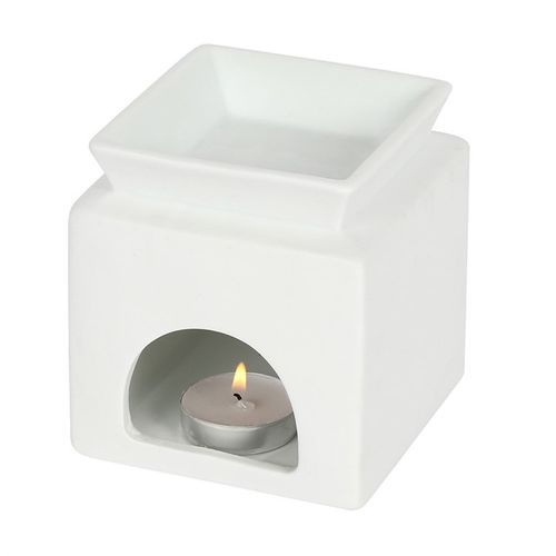 White Home Cut Out Oil Burner in ceramic with heart design, perfect for filling your home with calming fragrances.