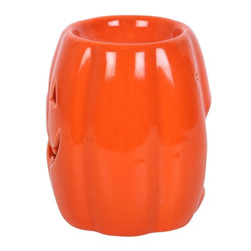 Bright orange Jack-o'-Lantern Oil Burner and Wax Warmer perfect for creating a cosy Halloween atmosphere.