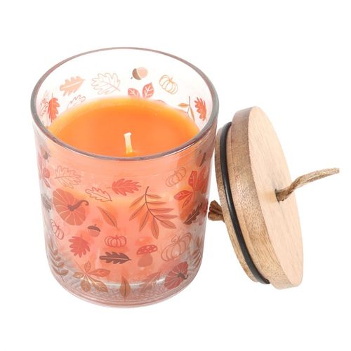 Autumn Leaves Cinnamon candle in a decorative jar with a wooden lid, perfect for cosy autumn days.