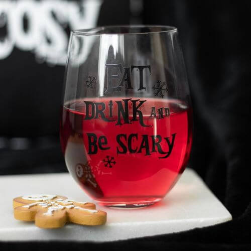 Stemless glass with 'Eat, Drink & Be Scary' design, perfect for festive drinks this Creepmas season.