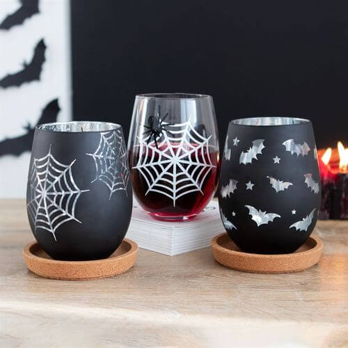 Bat Stemless Wine Glass: black matte with clear bat designs and silver interior, ideal for Halloween parties.