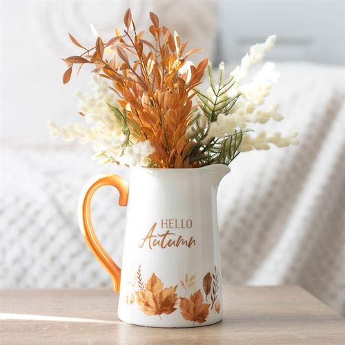 Elevate your autumn decor with the 17cm Hello Autumn Ceramic Flower Jug featuring a charming leaf design.