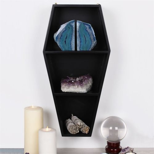 Coffin Shelving Display showcasing unique ornaments, perfect for adding a striking focal point to any room.