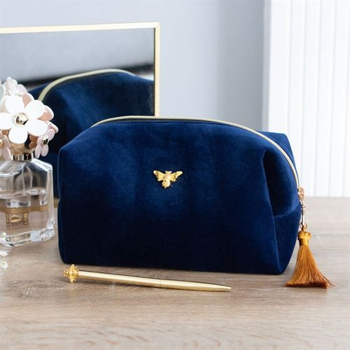 Stylish Bee-utiful Velvet Makeup Bag with gold bee accent and tassel, perfect for travel and home use.