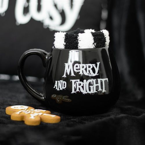 Merry and Fright Mug and Socks Set featuring a spooky black mug and fluffy striped socks for cosy winter nights.