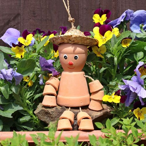 Charming Small Terracotta Pot Man with a straw hat, perfect for adding personality to your garden or outdoor space.