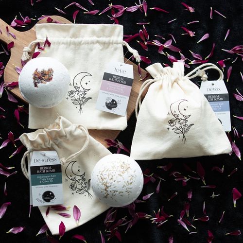 Indulge in the 'Detox' Herbal Lavender Bath Bomb, featuring natural ingredients for a purifying bath experience.