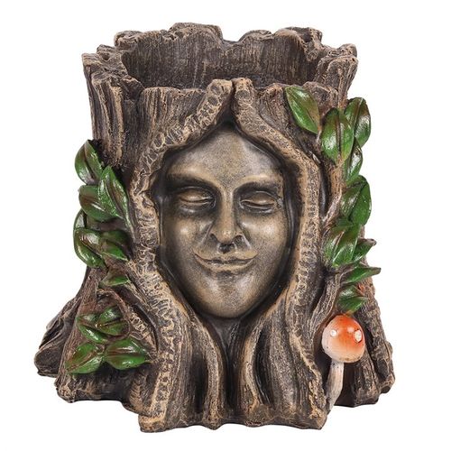 The Green Goddess Plant Pot features a charming design for enhancing your garden's beauty and style.