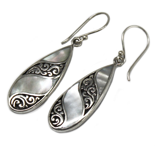 Elegant Shell and silver teardrop earrings, handmade in Bali, perfect for adding flair to any outfit.