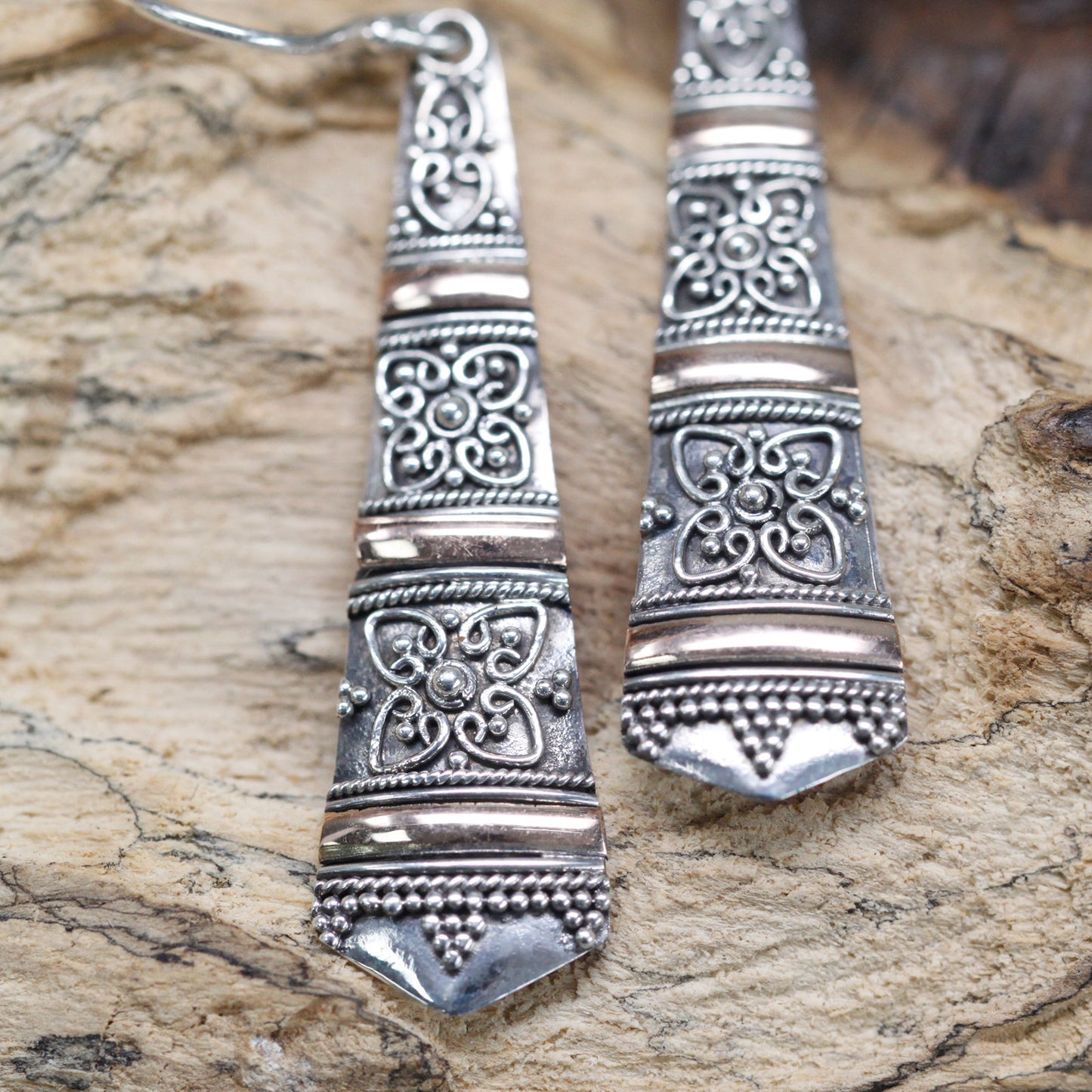 Elegant Silver and 18ct Gold tribal drop earrings, handmade in Indonesia, perfect for stylish occasions.