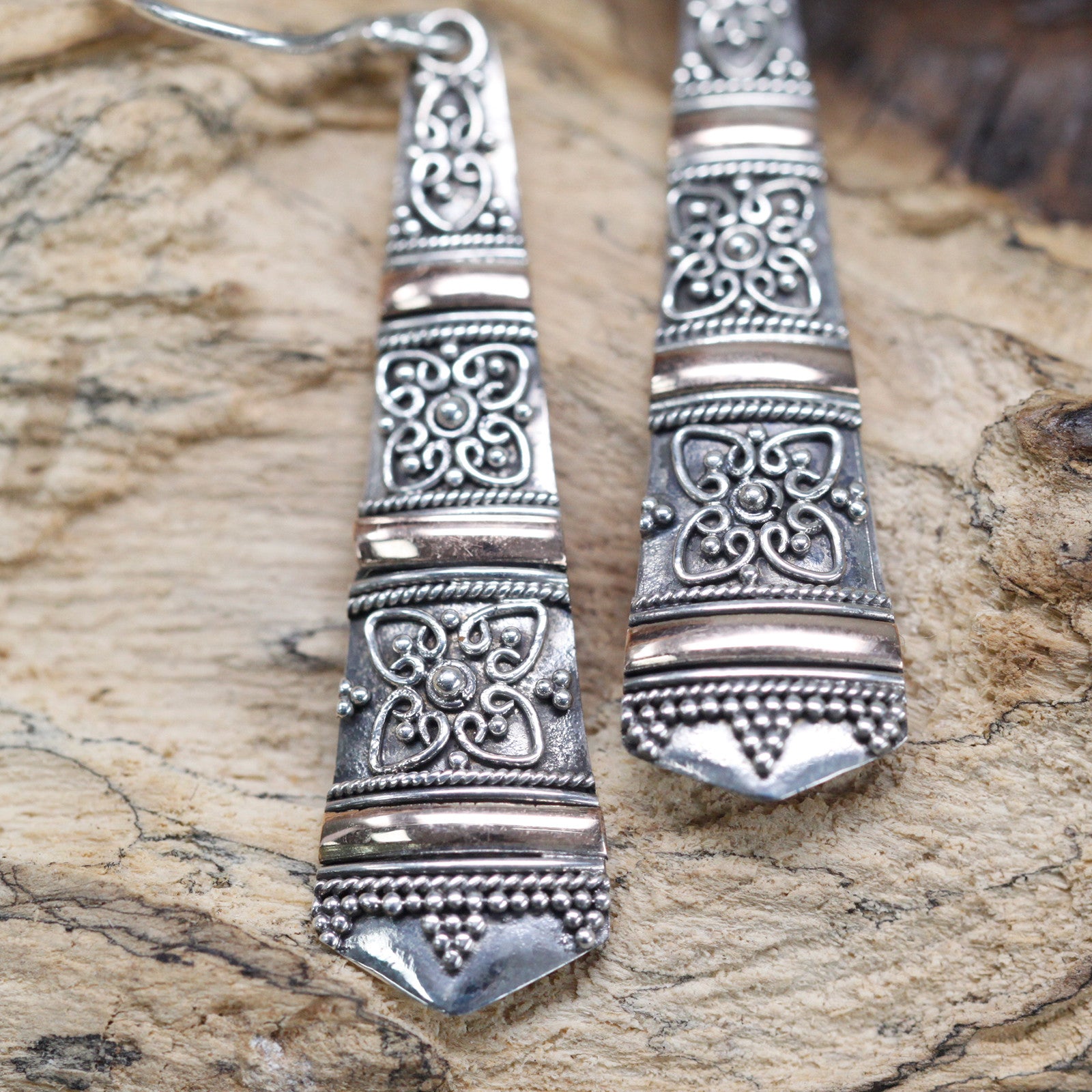 Elegant Silver and 18ct Gold tribal drop earrings, handmade in Indonesia, perfect for stylish occasions.