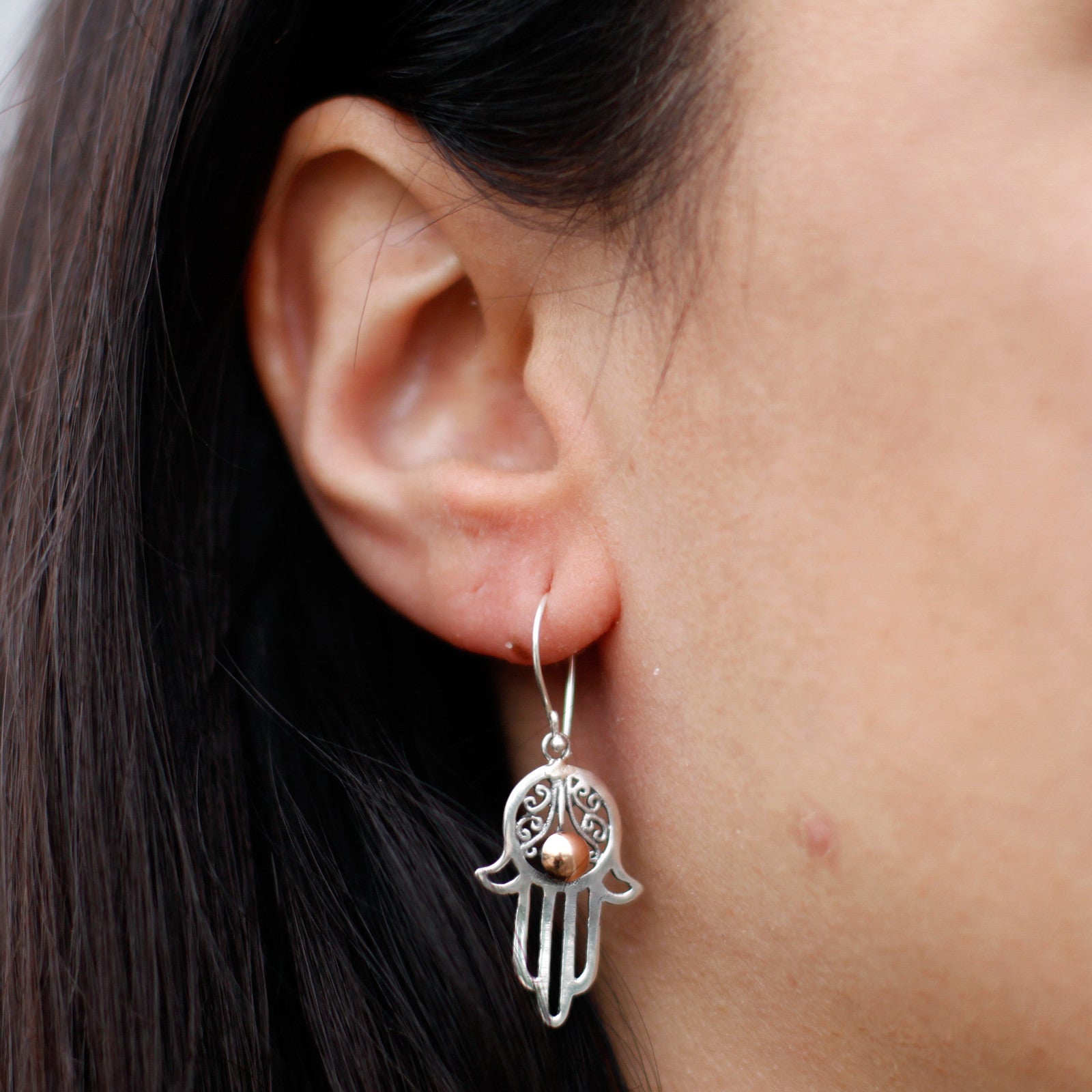 Elegant Silver & Gold Hamsa earrings, perfect for gifting and wearing with confidence. Ideal for any occasion.