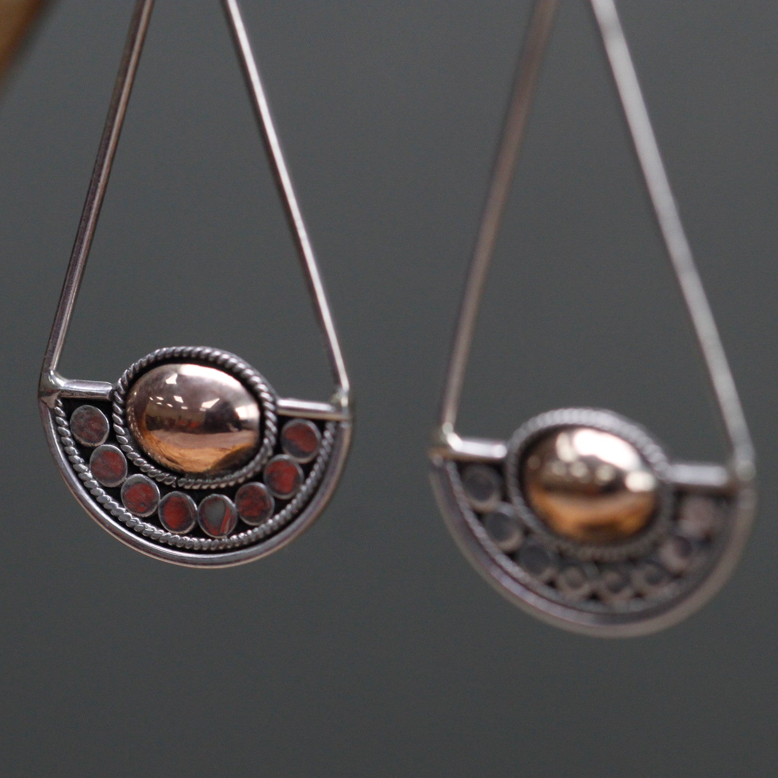 Elegant Silver and 18ct Gold earrings from Luna Balance, featuring a stylish hook design and unique detailing.