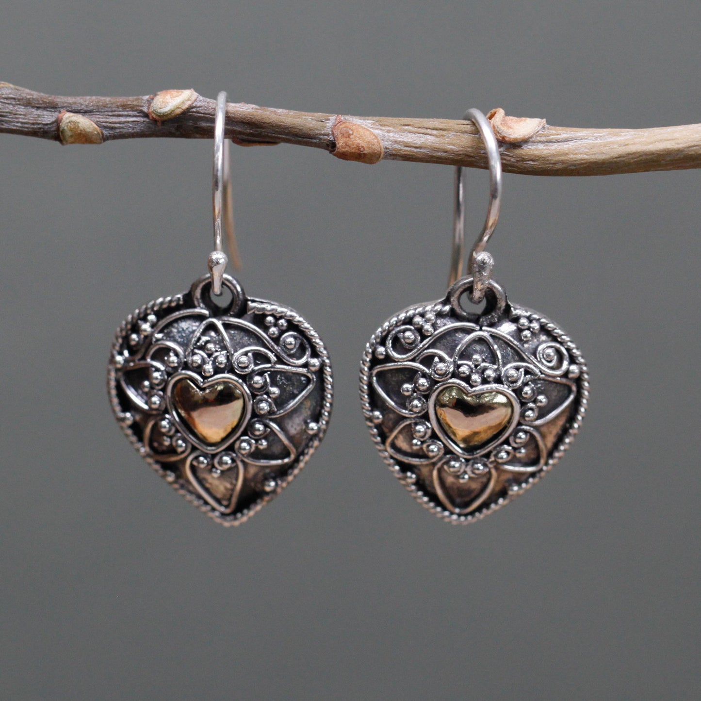 Elegant Silver & 18ct Gold Mandala Hearts earrings, perfect for adding charm to any outfit. Height: 1.6 cm.