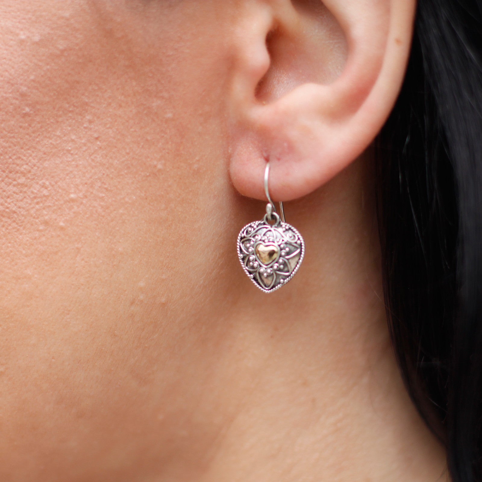Elegant silver and 18ct gold Mandala Hearts earrings, featuring a delicate heart design, perfect for any occasion.