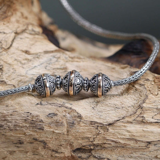 Elegant Silver & Gold Necklace -Tri featuring intricate design, crafted from 18k gold and 925 silver. 