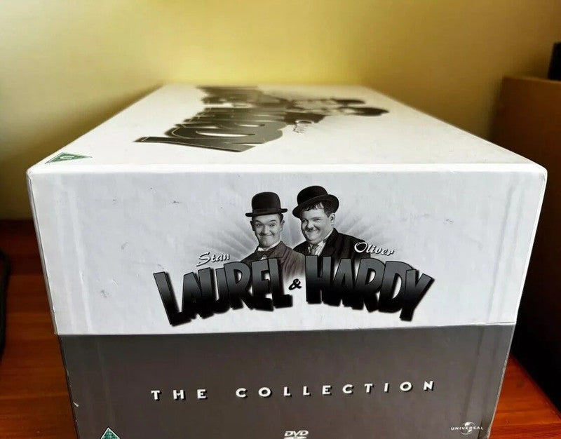 Laurel & Hardy - The Collection 21-disc DVD box set, featuring classic comedy in black and white for collectors.