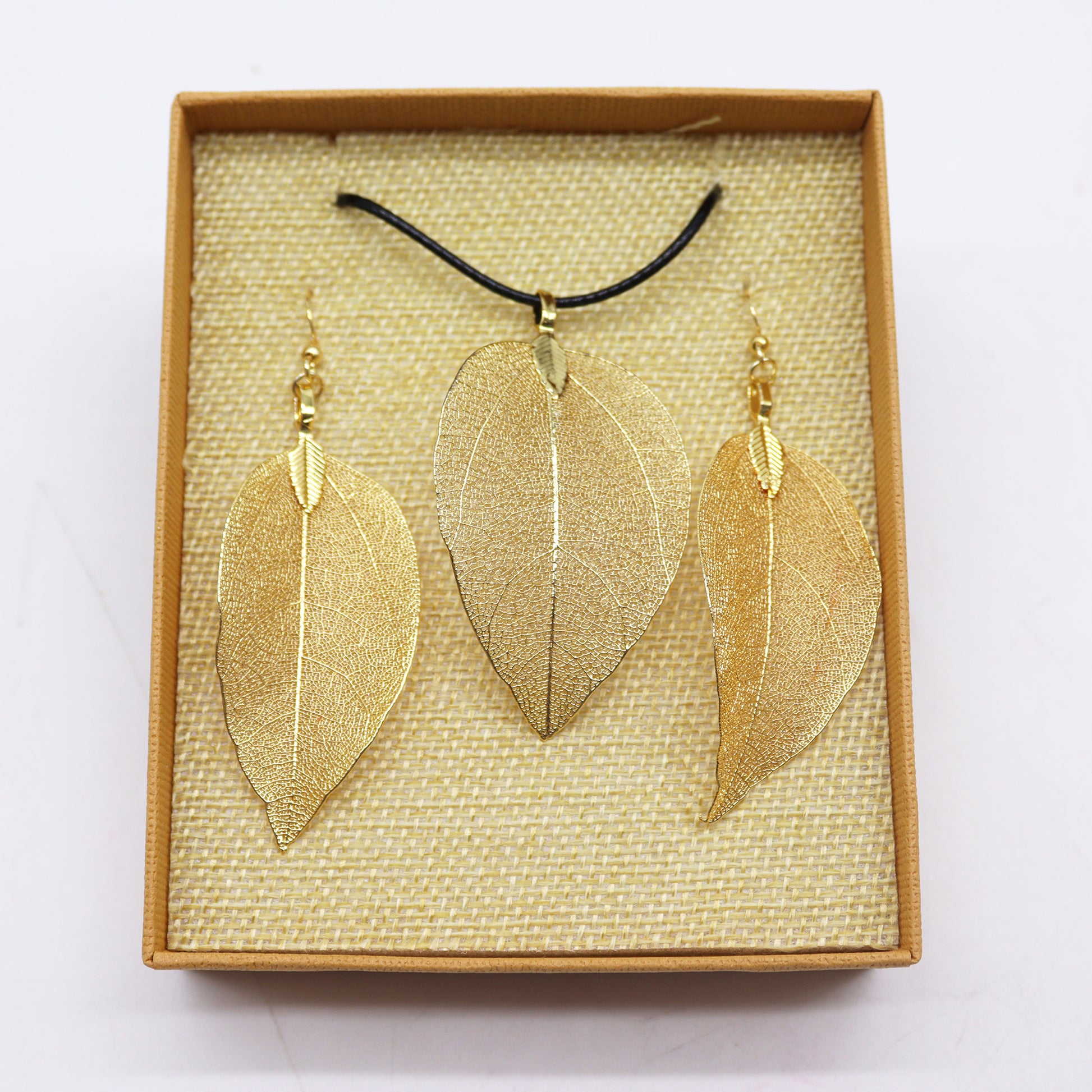 Gold Necklace and earring set featuring electro-plated real leaves, perfect for unique gifts.