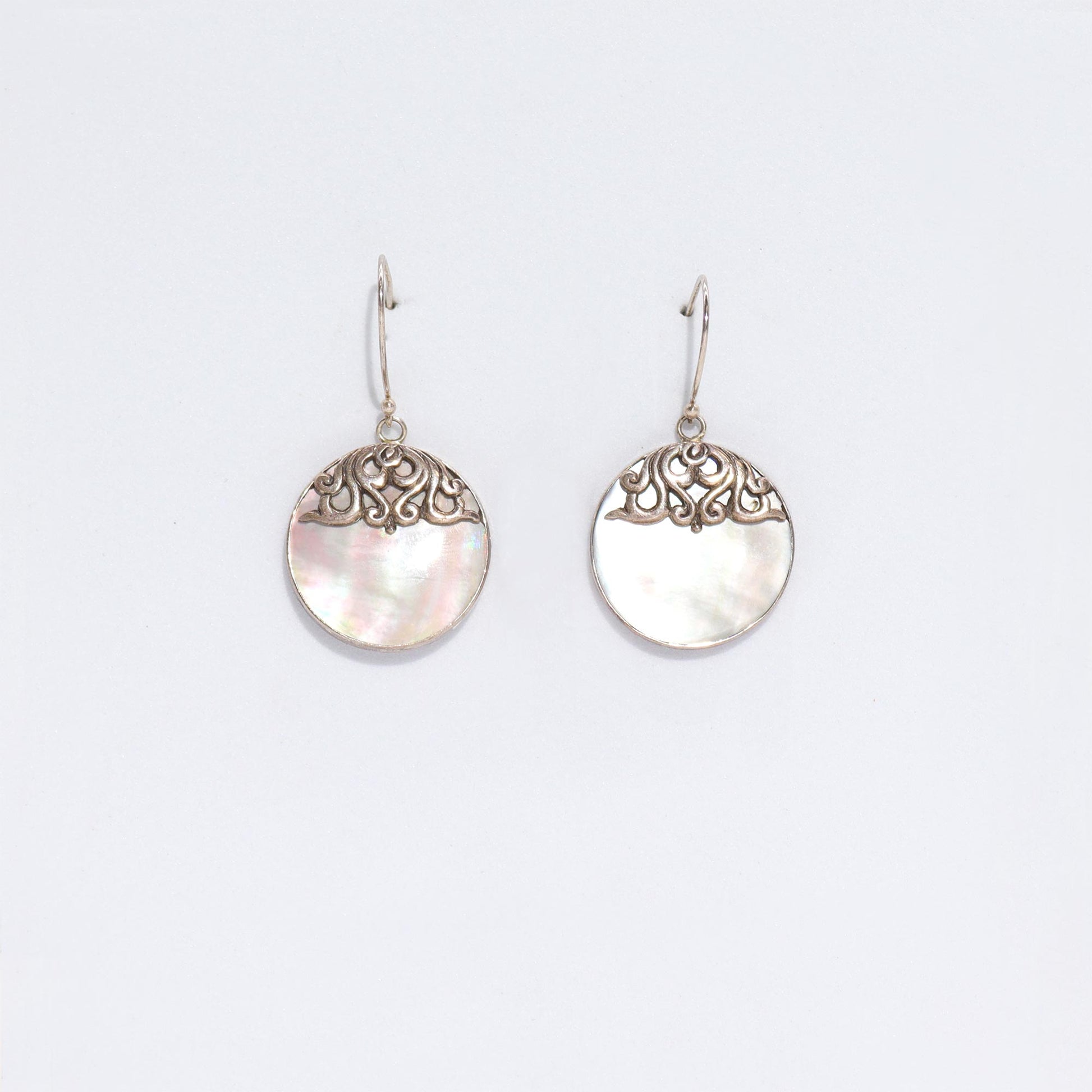 Elegant Shell & Silver Earrings - Classic Disc showcase unique craftsmanship, perfect for adding charm to any outfit.