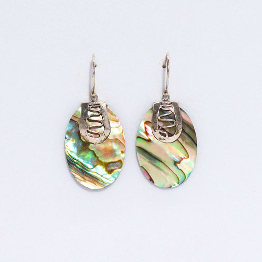 Stunning Shell & Silver Earrings featuring iridescent abalone, handcrafted with care in Bali for a unique accessory.