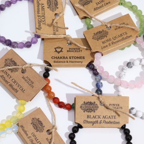 Power Bracelet - Tiger Eye showcased with other bracelets, perfect for style and harmony, ideal for any store.