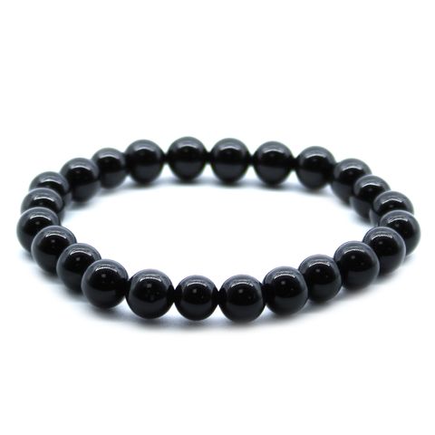 Stylish Power Bracelet - Black Agate, perfect for any outfit, offers protection, success, and courage benefits.