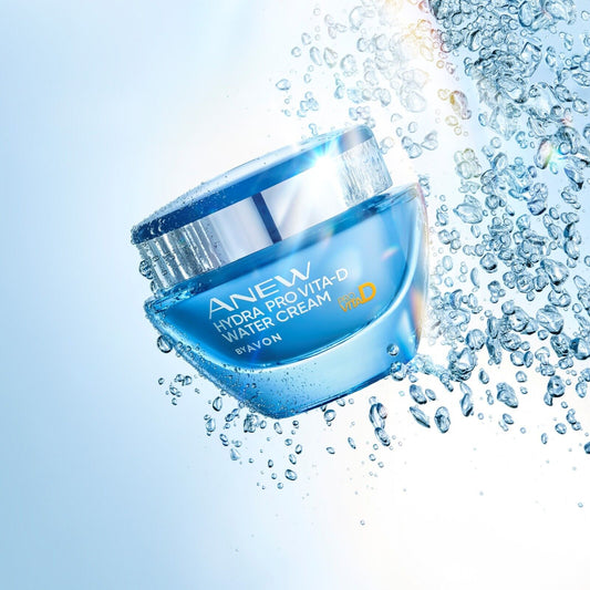 Avon Anew Hydra Pro Vita-D Water Cream surrounded by splashes, showcasing its hydrating power and radiant glow.