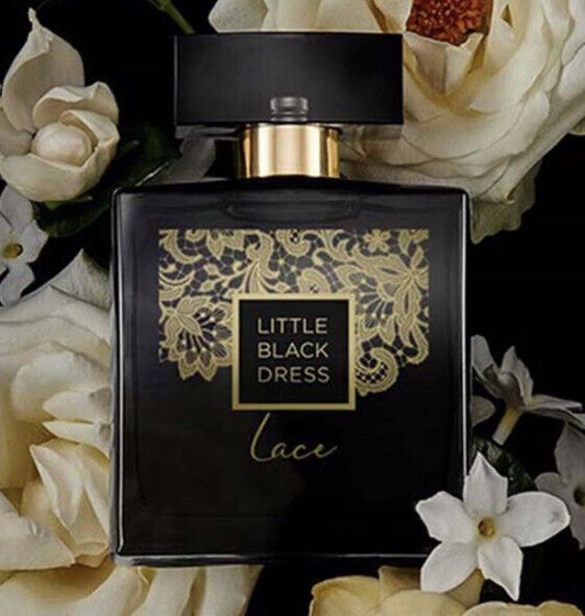 Avon Little Black Dress "Lace" EDP for Her in an elegant bottle, surrounded by delicate flowers, exuding sophistication.