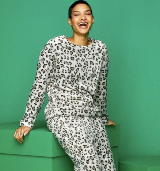 Stylish model showcasing the Avon Grey Leopard Print Lounge Set, perfect for comfort and modern elegance.