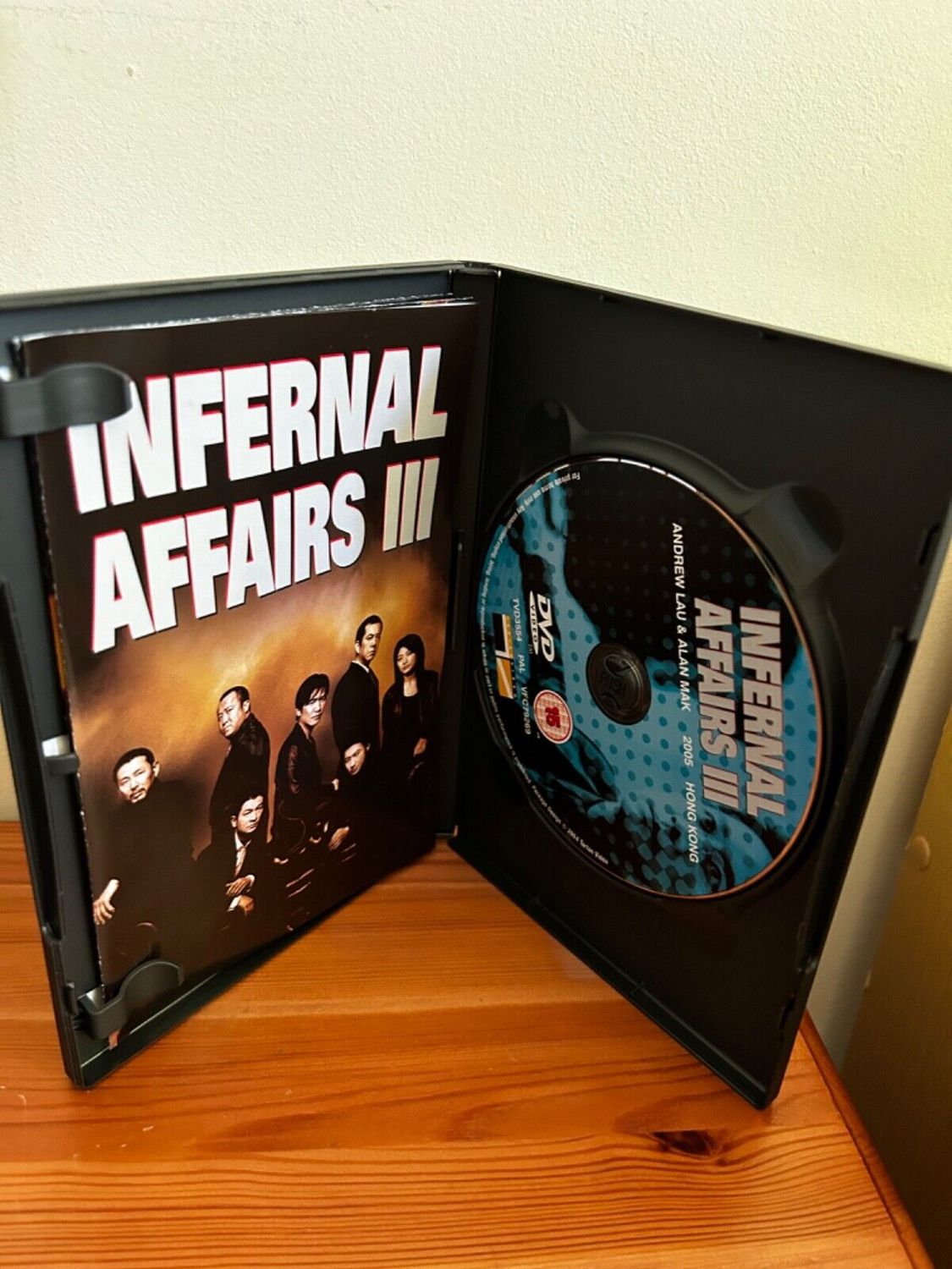 Explore Infernal Affairs - The Trilogy (DVD, 2005), a must-have for thriller enthusiasts on offer at our store.