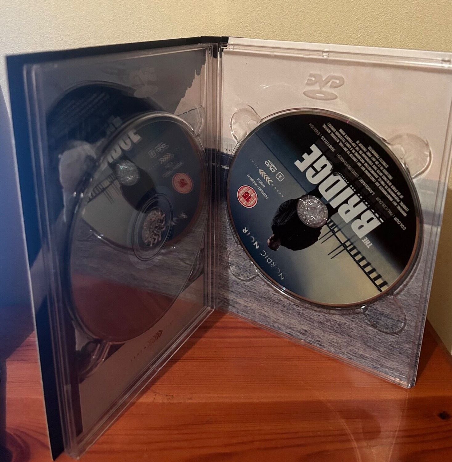 The Bridge: The Complete Series One (DVD) with all three discs for thrilling Danish drama. Available at your favourite store.