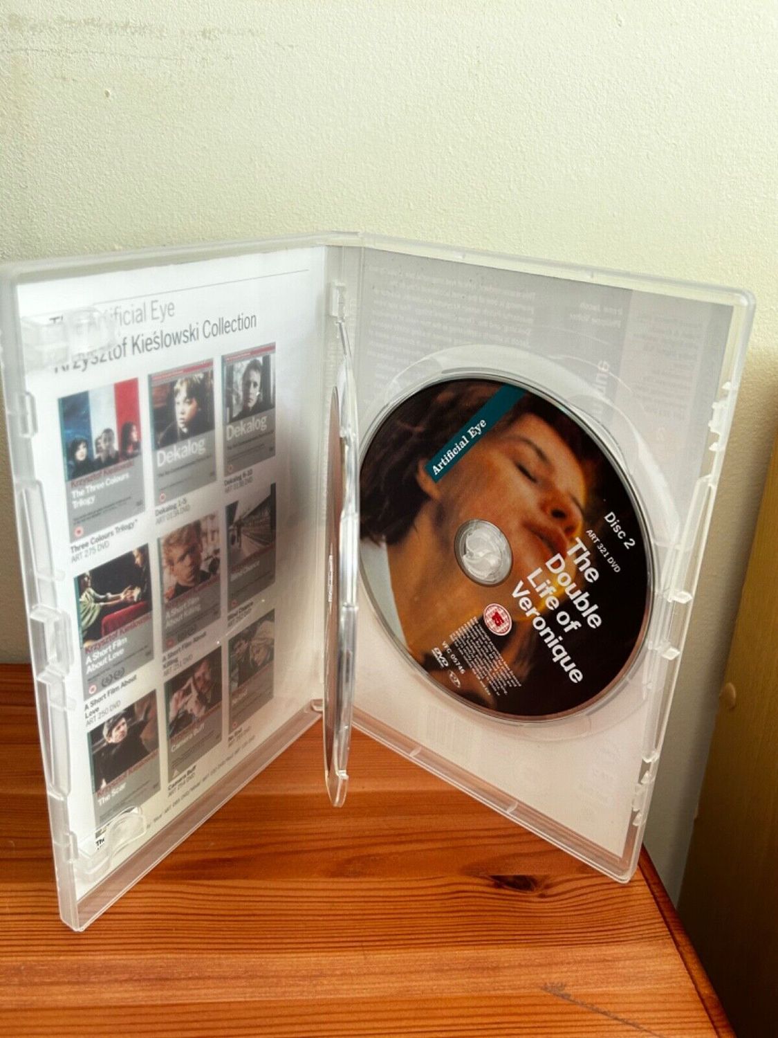 The Double Life Of Veronique [DVD] displayed in a 2-disc collection, showcasing Kieslowski's cinematic masterpiece.