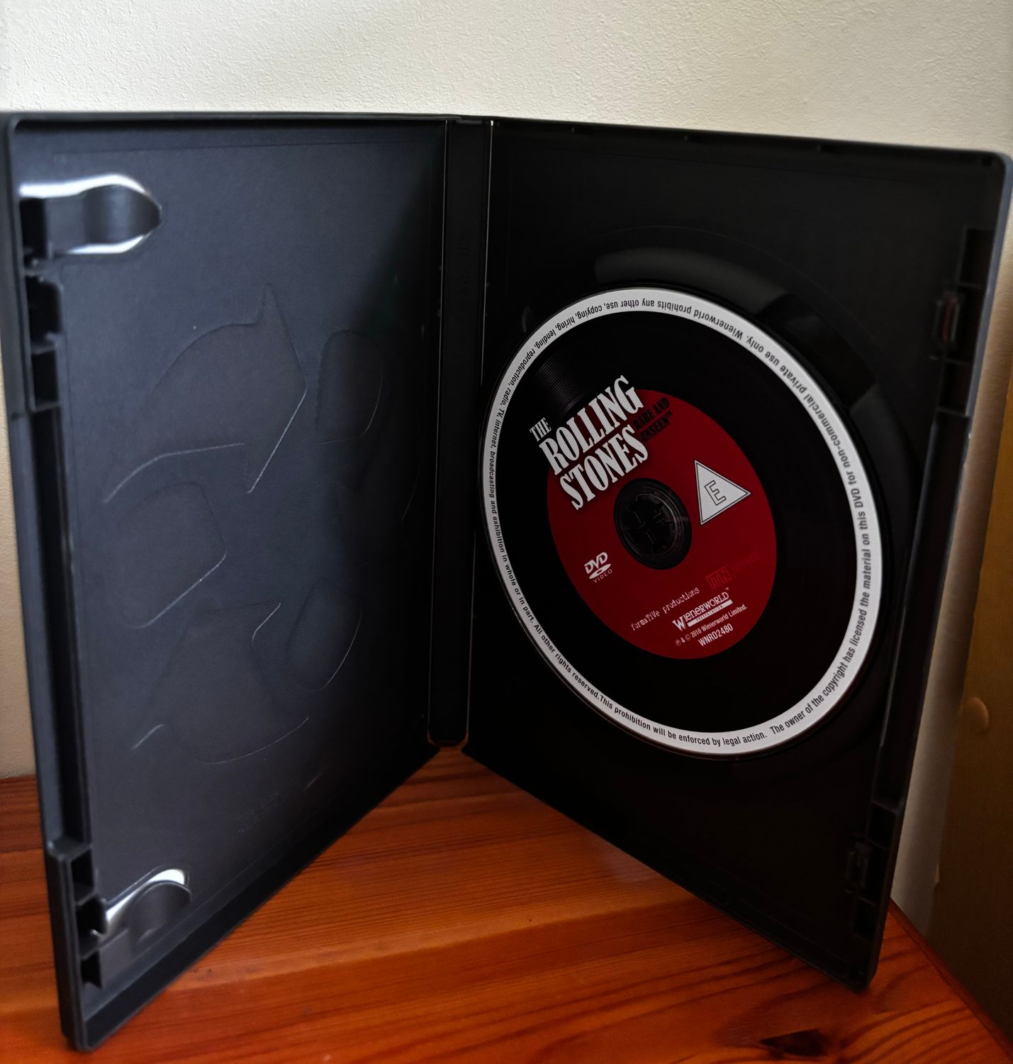 The Rolling Stones Rare and Unseen (DVD) showcases the iconic band's legacy in a captivating pre-loved format.