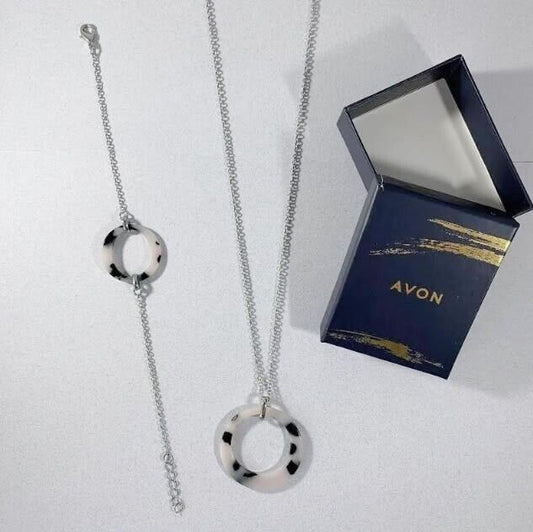 Avon Michelle Necklace & Bracelet Gift Set showcases elegant silver tone and grey hues, perfect for any occasion.