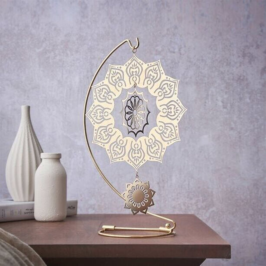Decorate your home with the elegant Avon Mandala Sun Spinner, crafted in stunning gold-tone stainless steel.