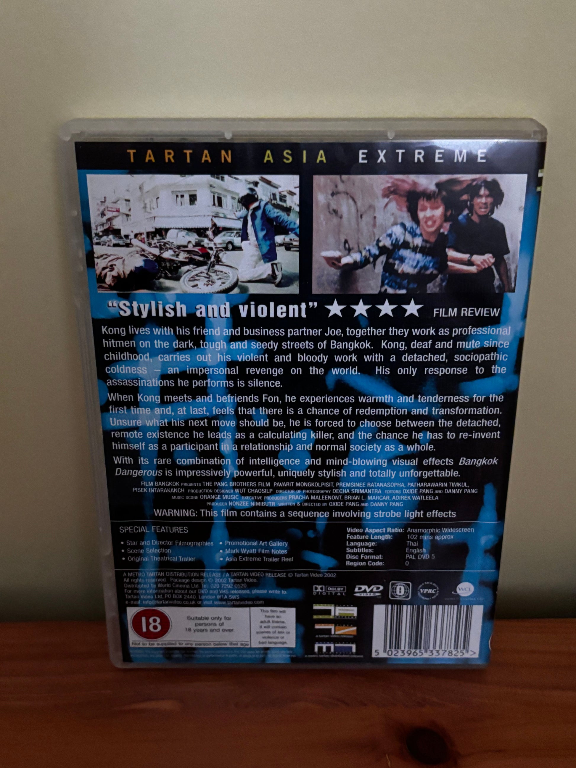 Bangkok Dangerous [2002] [DVD] Thrilling Action Drama Film back cover showing film synopsis and special features at Tartan Asia Extreme.
