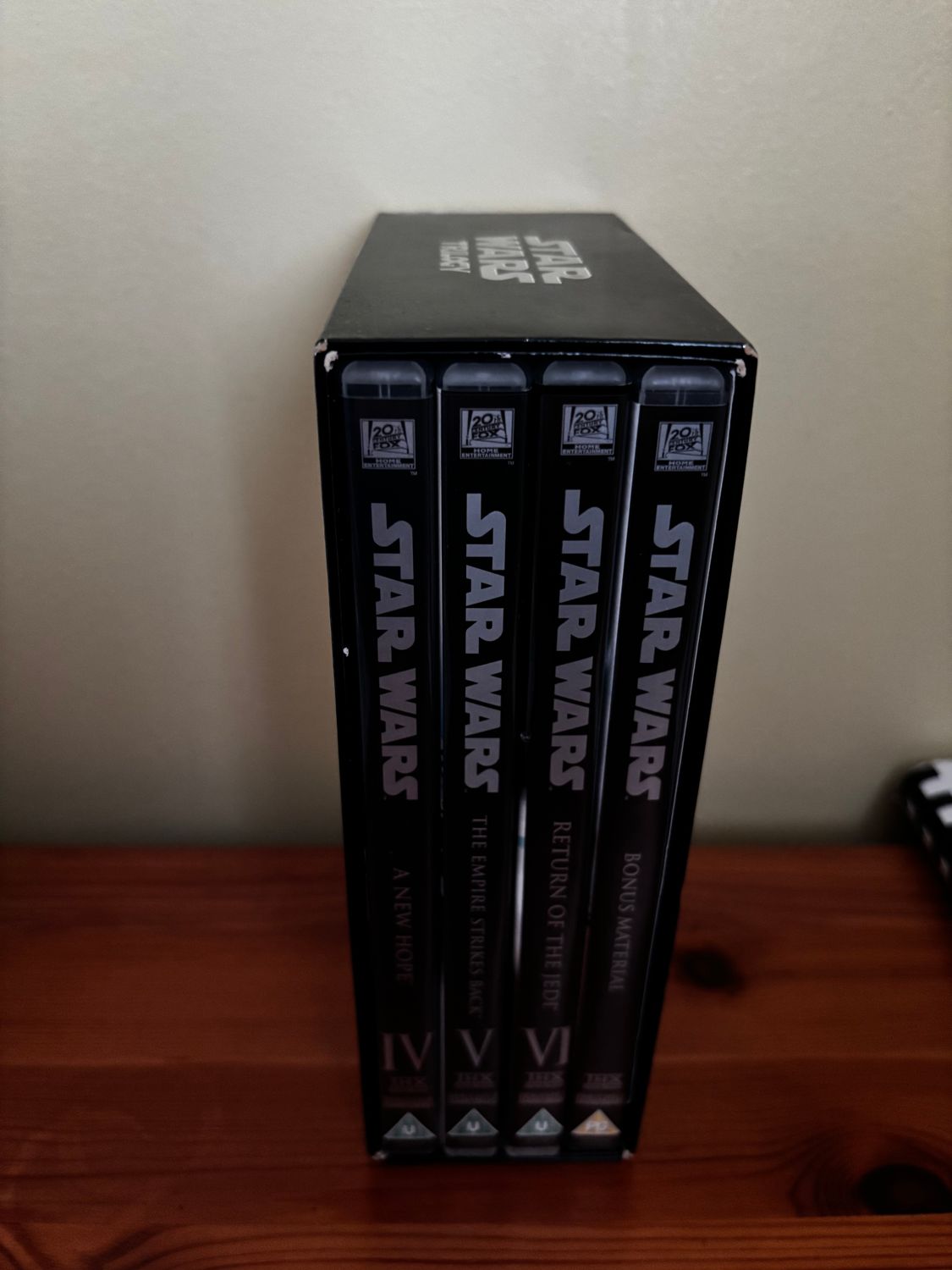Star Wars Trilogy: Episodes IV, V and VI DVD (2006) Mark Hamill, Lucas (DIR) showcases classic films in a sleek box set.