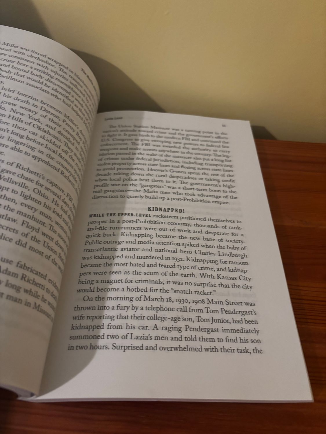 Open pages of "The Mafia and the Machine The Story of the Kansas City Mob," revealing thrilling insights into organised crime.