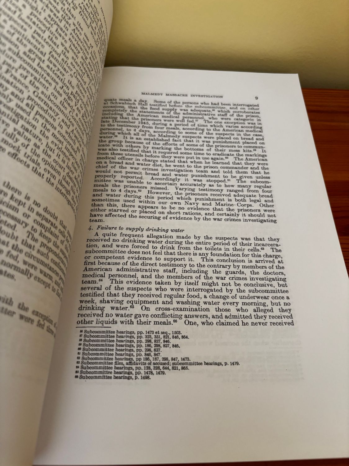 Detailed page from the Malmedy Massacre Investigation Paperback discussing Senate hearings and prisoner conditions.