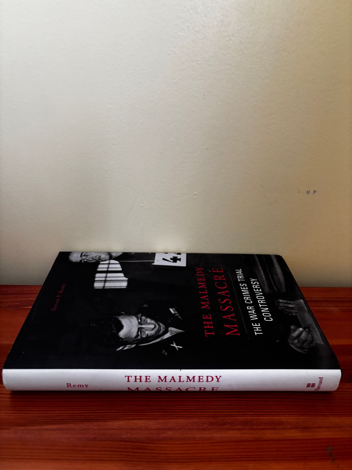 The Malmedy Massacre (Hardback), an insightful exploration of war crimes by Steven P. Remy, available at Harvard University Press.