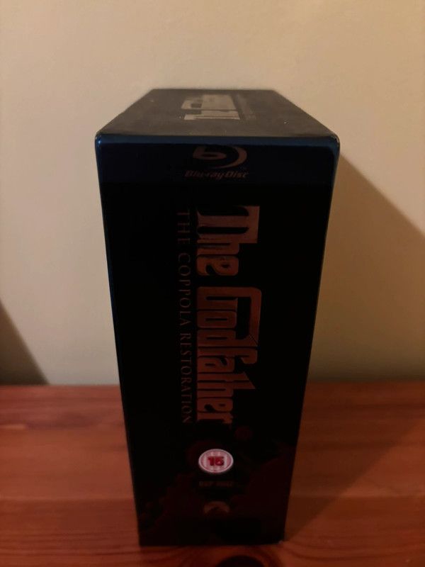 The Godfather Coppola Restoration [Blu-ray] [1972] [Region Free] showcased in a collector's edition box set.