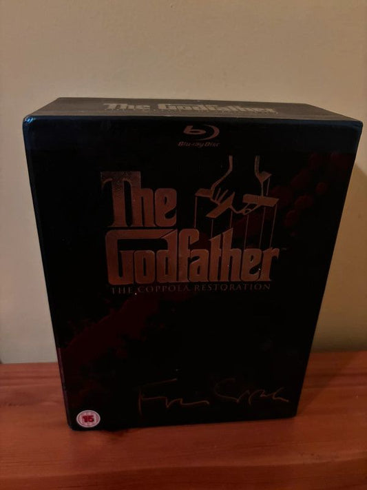 The Godfather Coppola Restoration [Blu-ray] [1972] [Region Free] showcased in a collector's edition box set.
