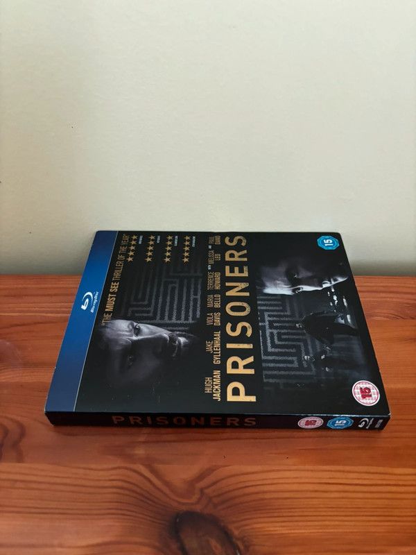Prisoners [Blu-ray] showcases a gripping thriller with stellar performances from Hugh Jackman and Jake Gyllenhaal.
