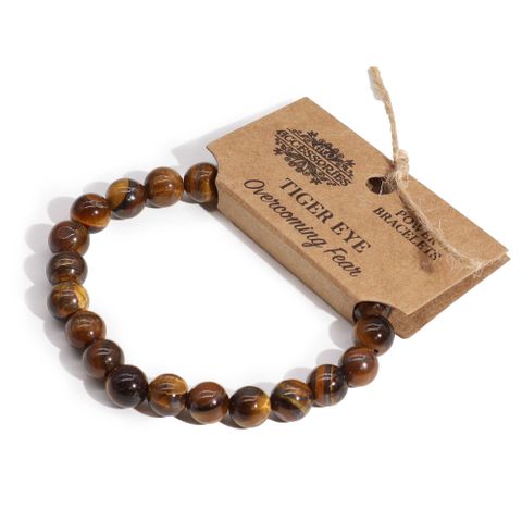 Beautiful Power Bracelet - Tiger Eye, enhances any outfit while promoting harmony and balance in style.