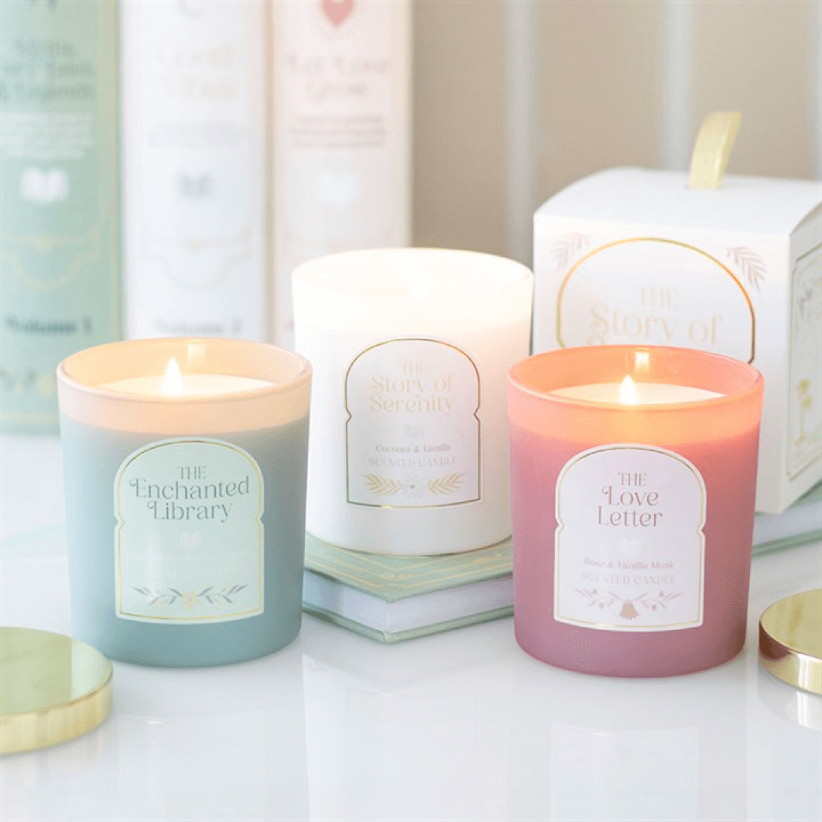 The Story Of Serenity Coconut And Vanilla Scented Candle alongside other beautifully packaged candles.