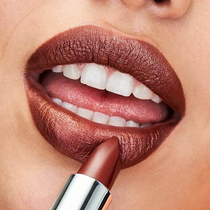 Avon Ultra Shimmer Lipstick Pearl Pigment Finish - Choose Your Shade applied on lips.