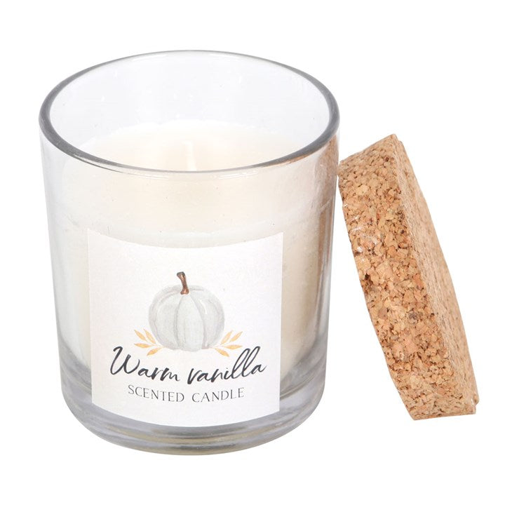 Warm Vanilla Autumn Candle in a glass holder with cork lid, perfect for cosy autumn days and 25-hour burn time.