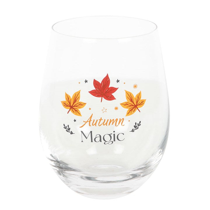 Elegant Autumn Magic Stemless Glass featuring autumn leaves and golden stars, perfect for wine or cider.