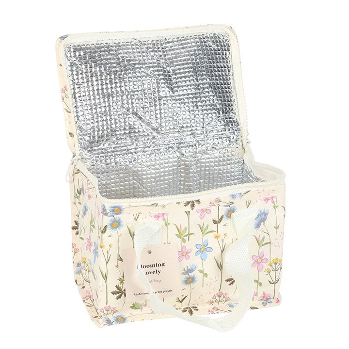 Brighten lunch breaks with the Blooming Lovely Floral Lunch Bag, featuring recycled materials and vibrant wildflower designs.