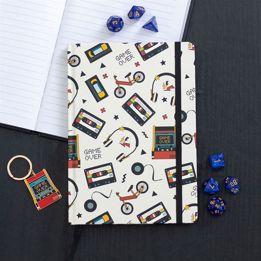 Retro 80s Print A5 Notebook features nostalgic designs of cassette tapes, bikes, and game controllers for creative notes.